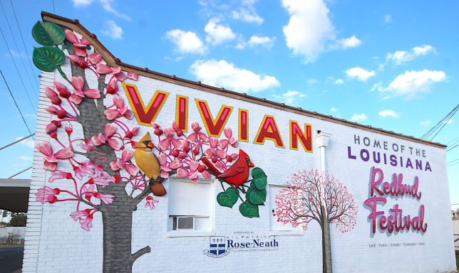 Mural of redbuds on side of building with "Vivian Redbud Festival"