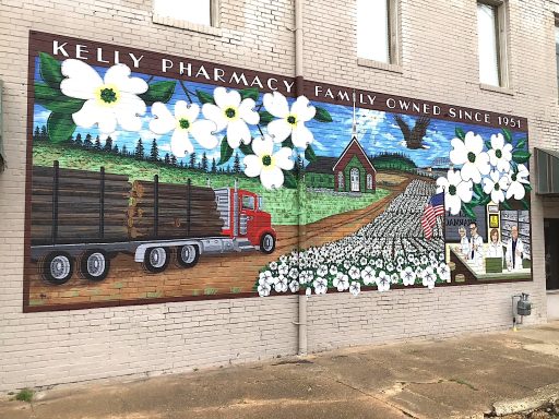 Mural of cotton field on side of a building